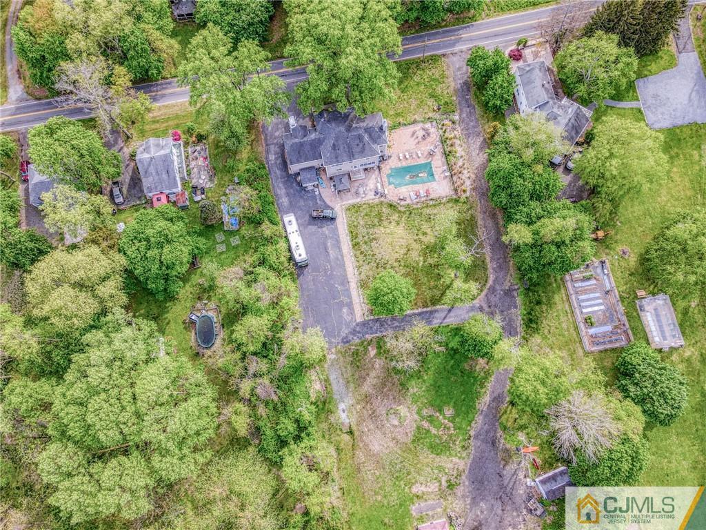 85 Davidson's Mill Road North Brunswick, NJ 08902 - Photo 7 of 39 an aerial view of residential house with outdoor space and trees all around