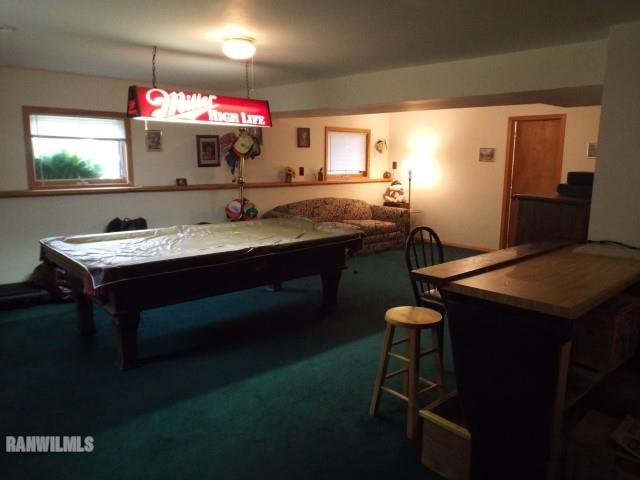 8011 Haas Road Savanna, IL 61074 - Photo 15 of 36 a kitchen with a table and chairs in it