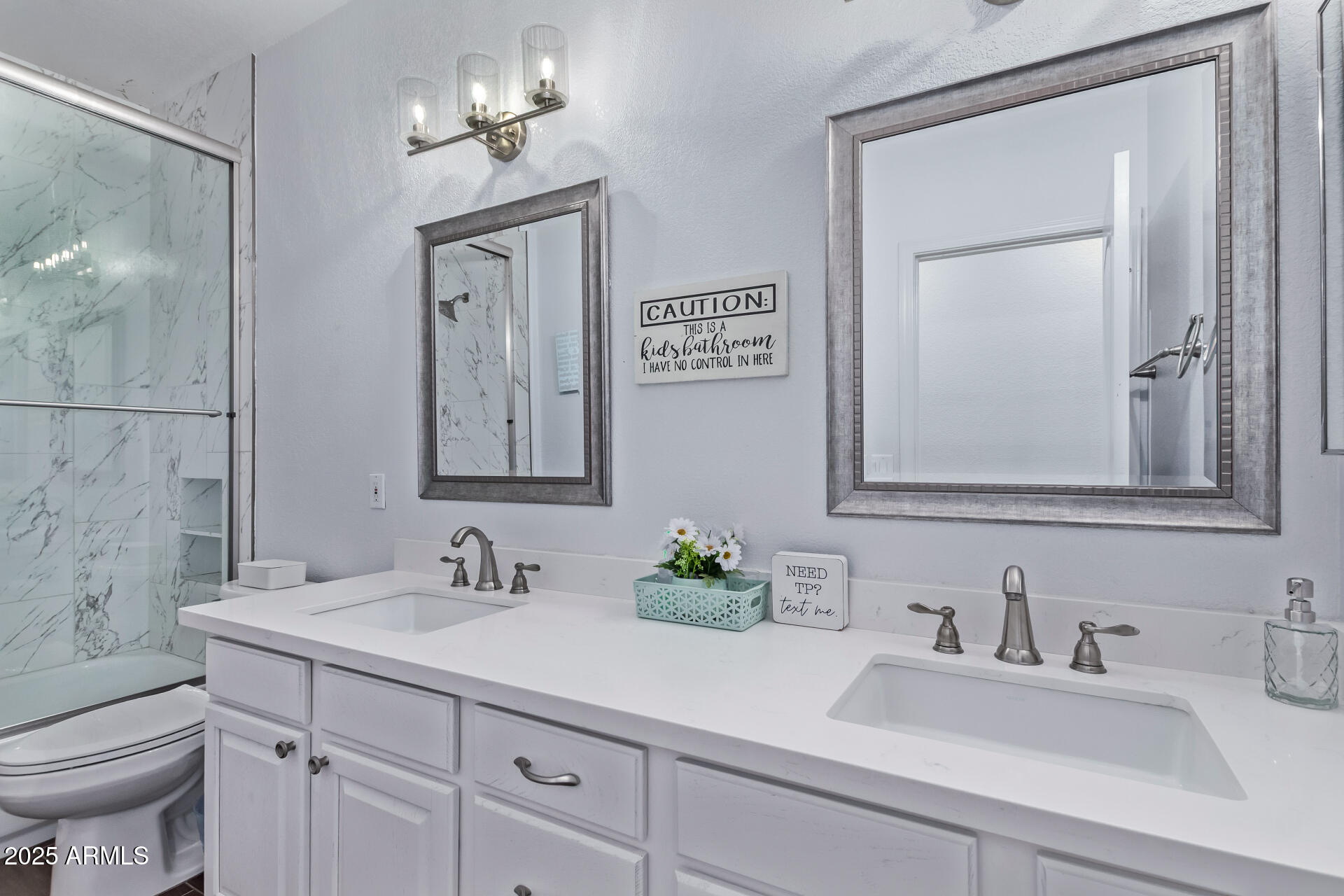 2225 West Carter Road Phoenix, AZ 85041 - Photo 26 of 33 a bathroom with a sink and a toilet