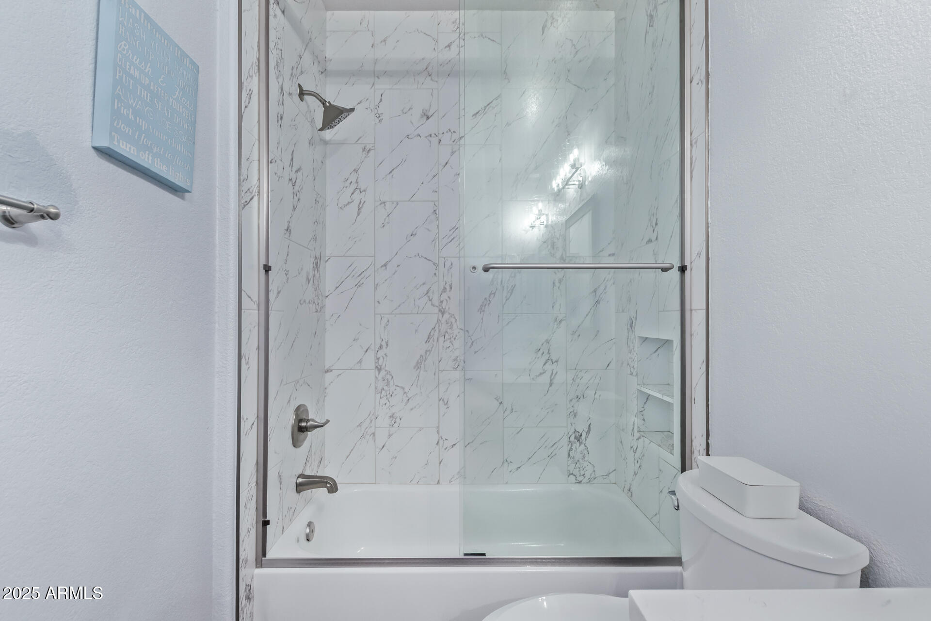 2225 West Carter Road Phoenix, AZ 85041 - Photo 27 of 33 a bathroom with a shower