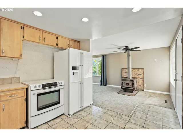 a view of a kitchen with a sink
