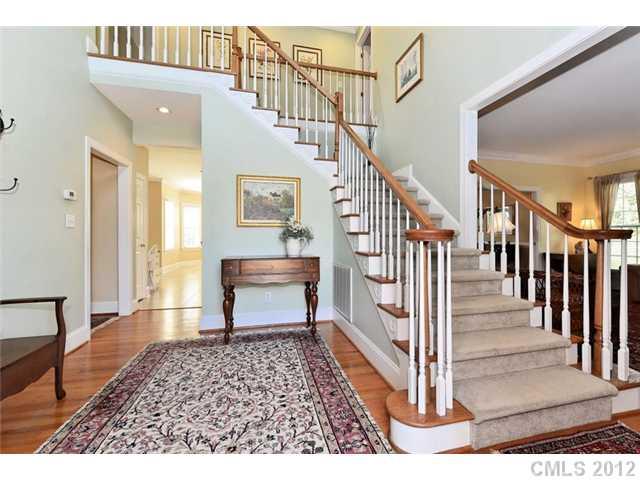 109 Fairwind Court Fort Mill, SC 29708 - Photo 4 of 16 a view of entryway and hall with wooden floor