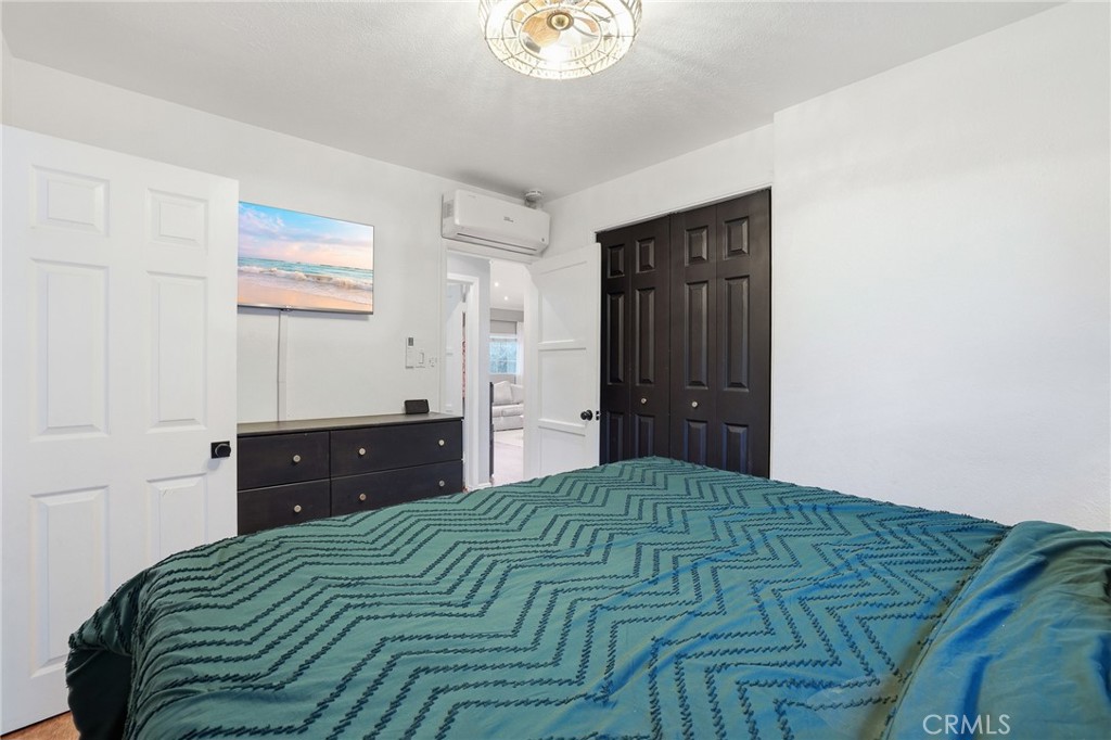 1954 Addison Way Los Angeles, CA 90041 - Photo 24 of 40 a bedroom with a bed and a dresser