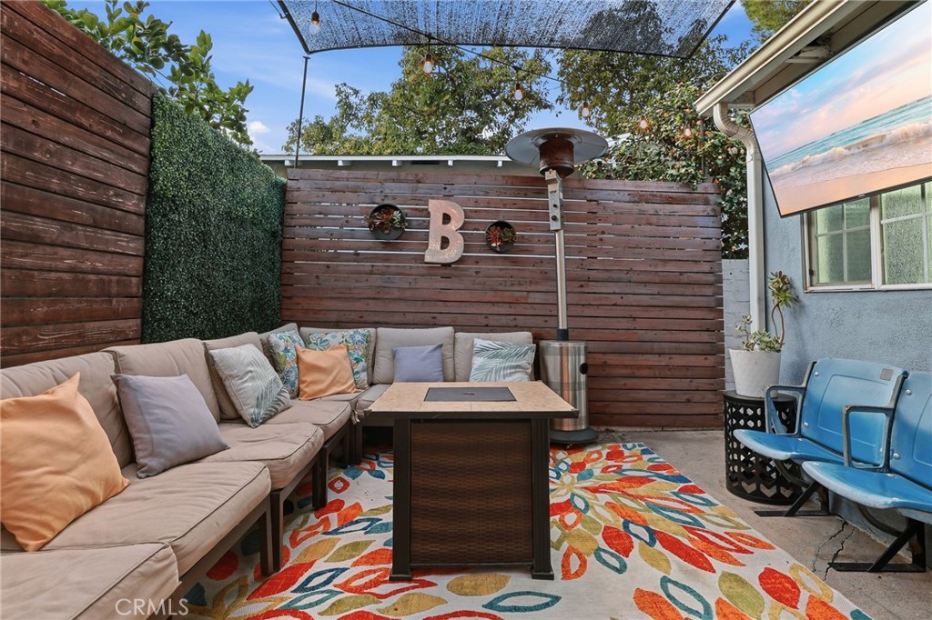 1954 Addison Way Los Angeles, CA 90041 - Photo 30 of 40 a backyard of a house with seating space and stainless steel appliances