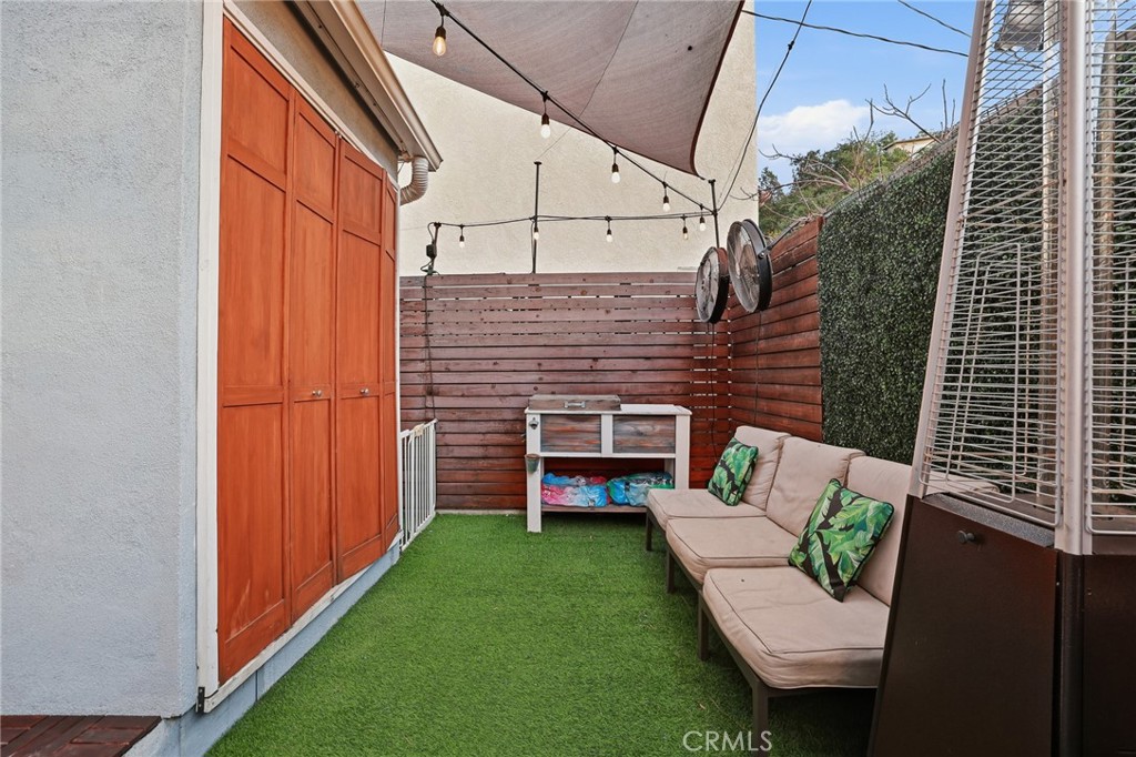 1954 Addison Way Los Angeles, CA 90041 - Photo 31 of 40 a backyard of a house with outdoor seating