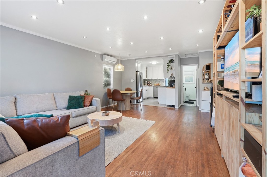 1954 Addison Way Los Angeles, CA 90041 - Photo 6 of 40 a living room with furniture and a wooden floor