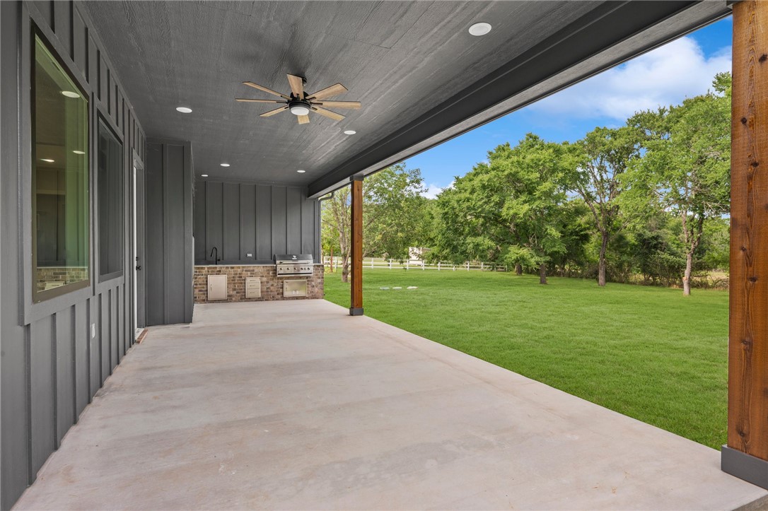 13291 Hopes Creek Road College Station, TX 77845 - Photo 31 of 45 View of patio featuring ceiling fan and an outdoor kitchen