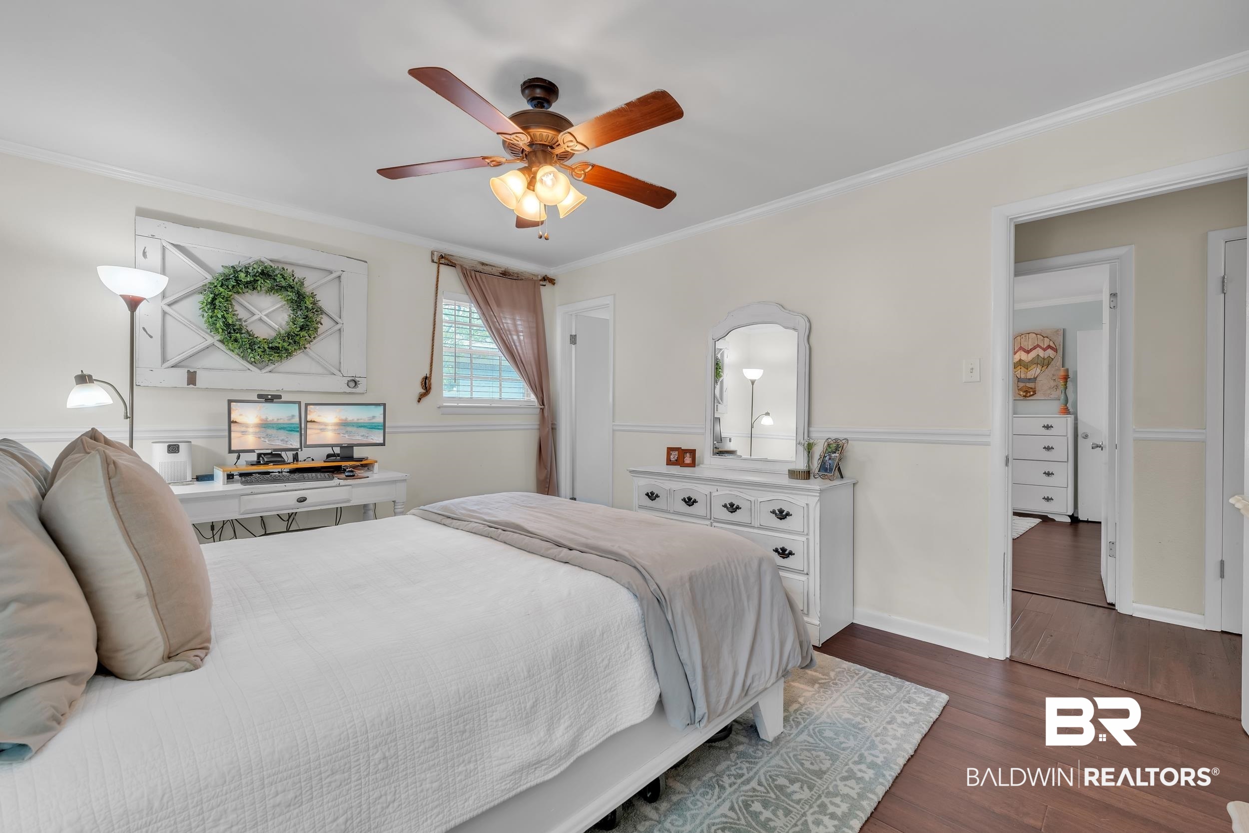224 Cache Circle Mobile, AL 36611 - Photo 17 of 42 Bedroom featuring ornamental molding, dark wood finished floors, baseboards, and a ceiling fan