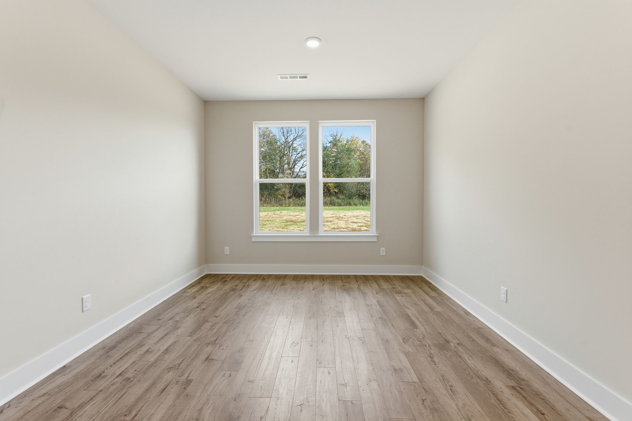 1429 Charles Drive Chapel Hill, TN 37034 - Photo 15 of 24 an empty room with wooden floor and windows