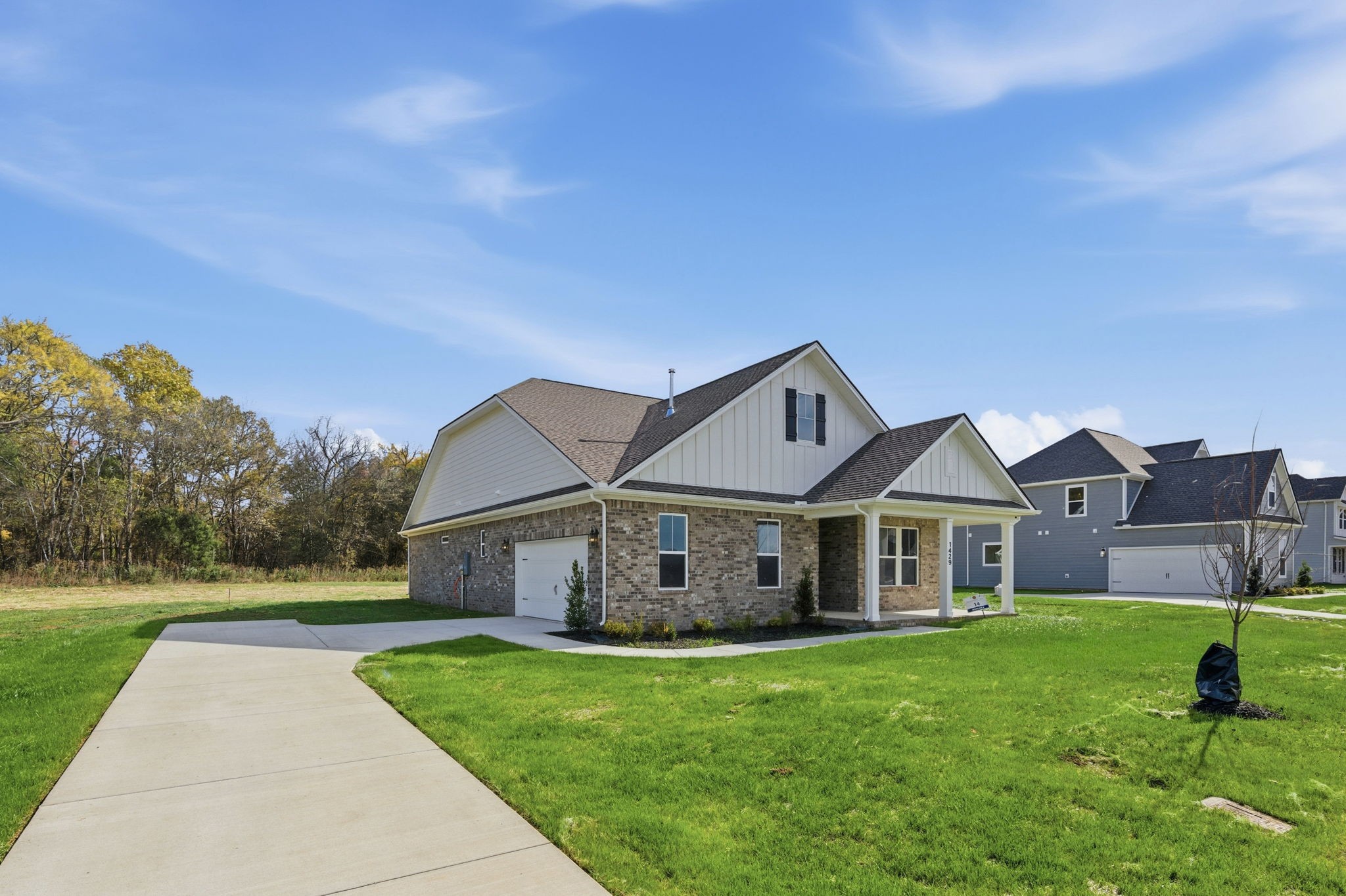 1429 Charles Drive Chapel Hill, TN 37034 - Photo 22 of 24 a view of an house with backyard and garden