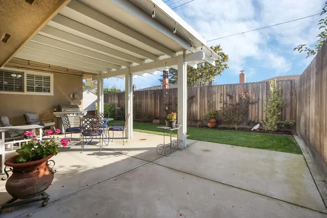 a building exterior with furniture