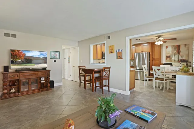 a living room with furniture and a table