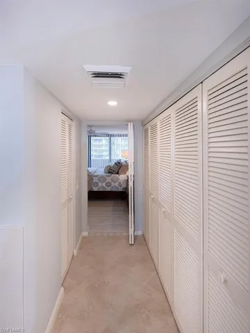 a view of living room with furniture and window
