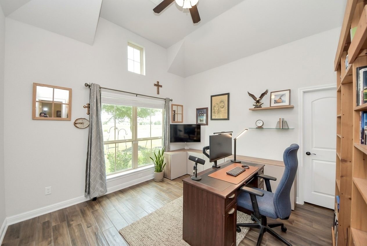 24503 Eucalyptus Way Spring, TX 77373 - Photo 15 of 27 a view of a workspace with furniture and a window