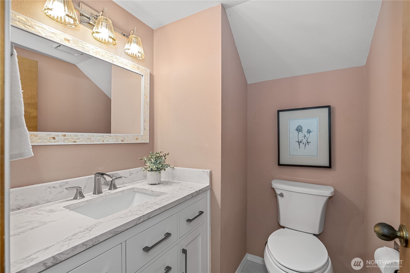 233 Clay Court Southeast Olympia, WA 98513 - Photo 21 of 33 a bathroom with a toilet sink and mirror