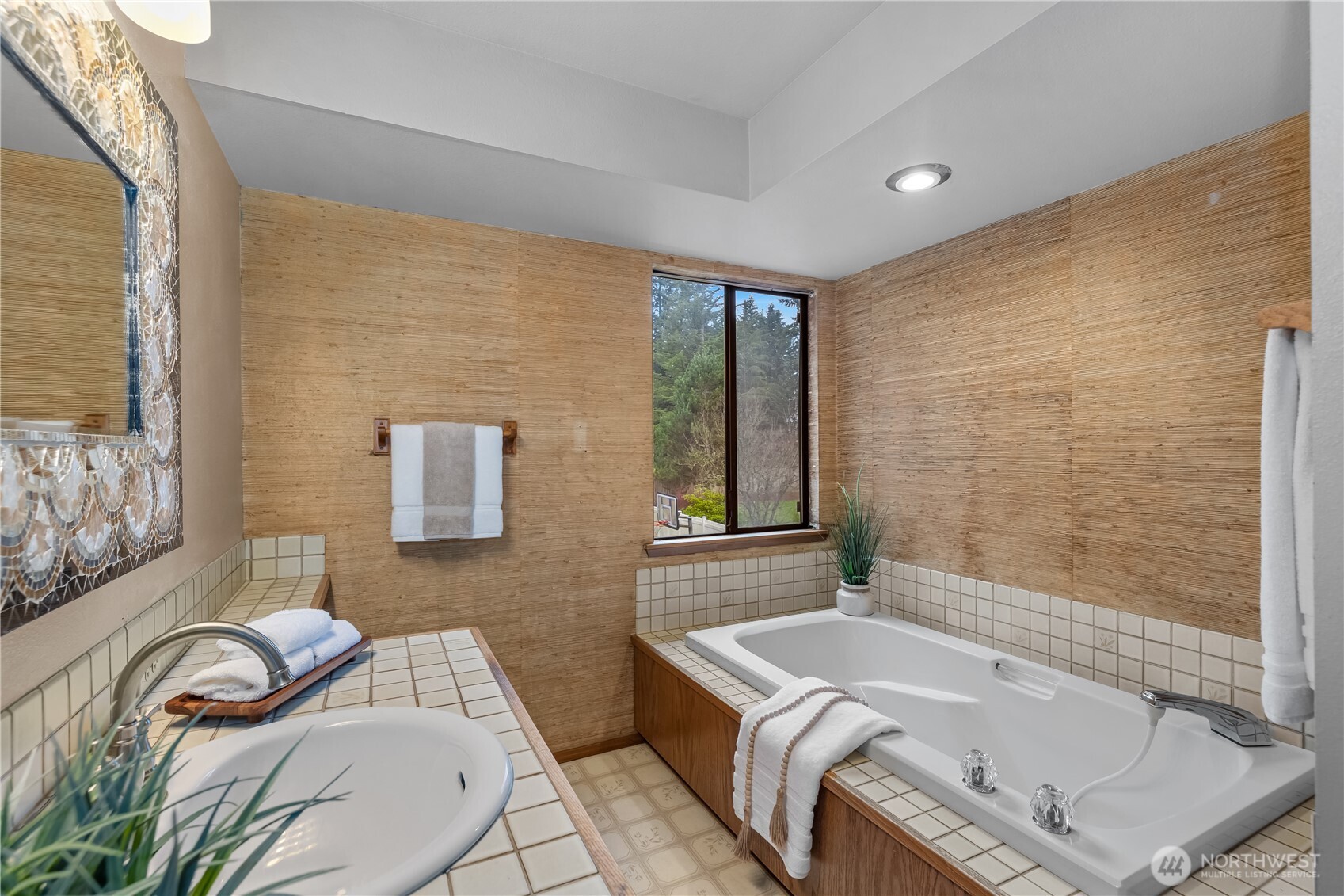 233 Clay Court Southeast Olympia, WA 98513 - Photo 25 of 33 a bathroom with a tub sink and mirror