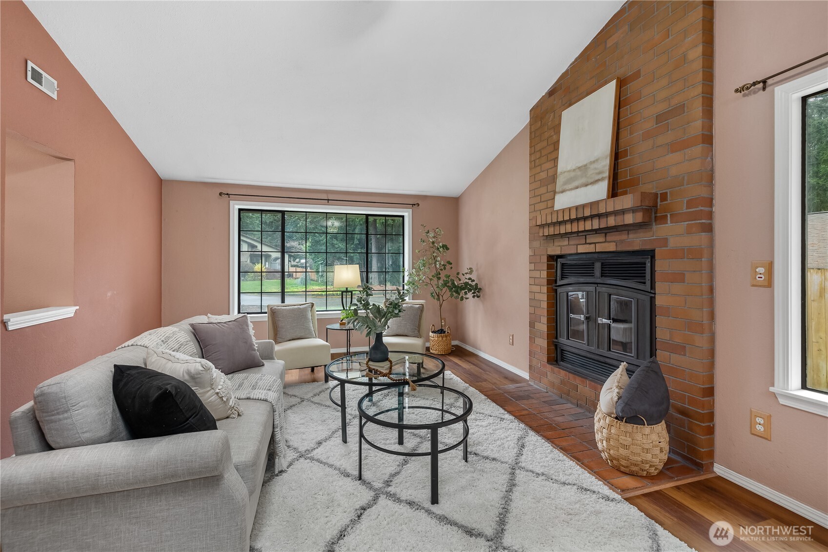 233 Clay Court Southeast Olympia, WA 98513 - Photo 8 of 33 a living room with furniture fireplace and flat screen tv