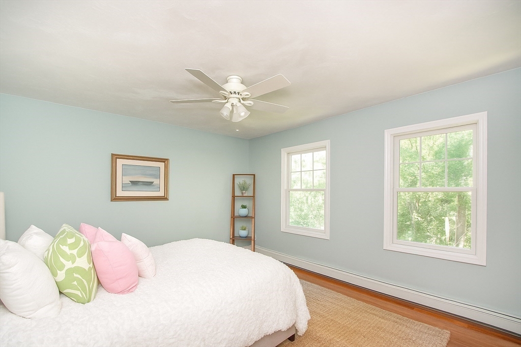 480 Ferry Street Marshfield, MA 02050 - Photo 14 of 34 a bedroom with a bed and a window