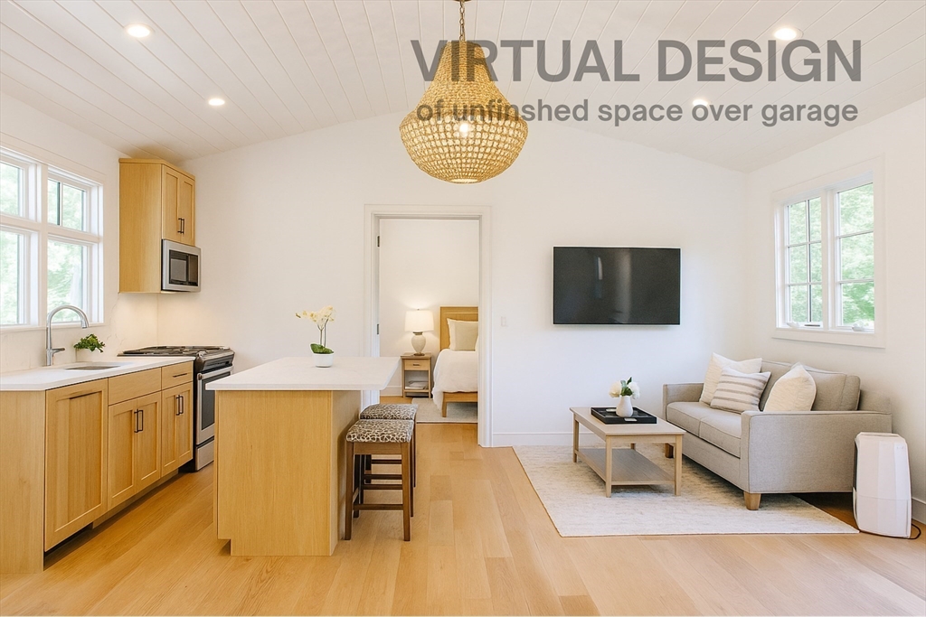 480 Ferry Street Marshfield, MA 02050 - Photo 24 of 34 a living room with furniture a window and a flat screen tv