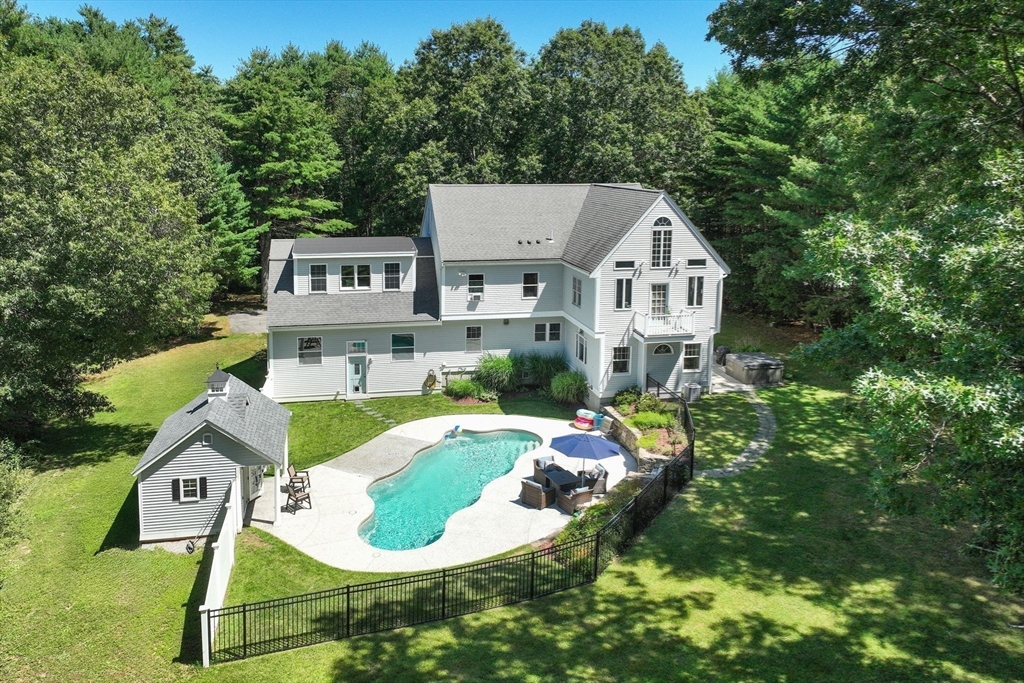480 Ferry Street Marshfield, MA 02050 - Photo 3 of 34 an aerial view of a house with swimming pool and garden