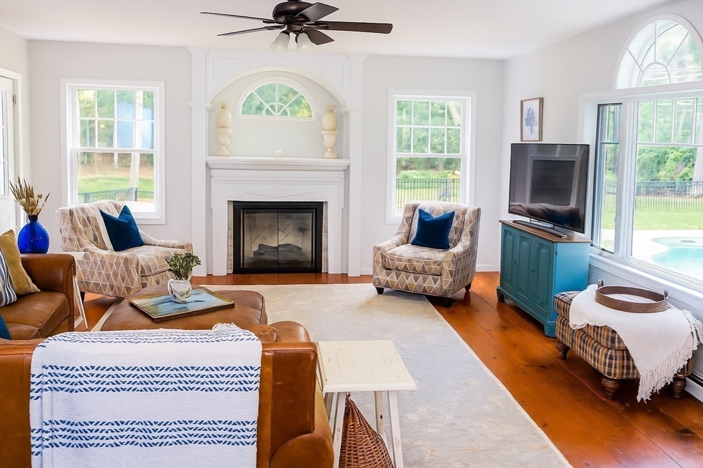 480 Ferry Street Marshfield, MA 02050 - Photo 7 of 34 a living room with furniture and a fireplace