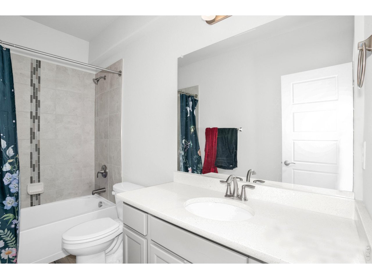 864 Frst Cyn Road Severance, CO 80550 - Photo 13 of 39 a bathroom with a granite countertop sink toilet and shower