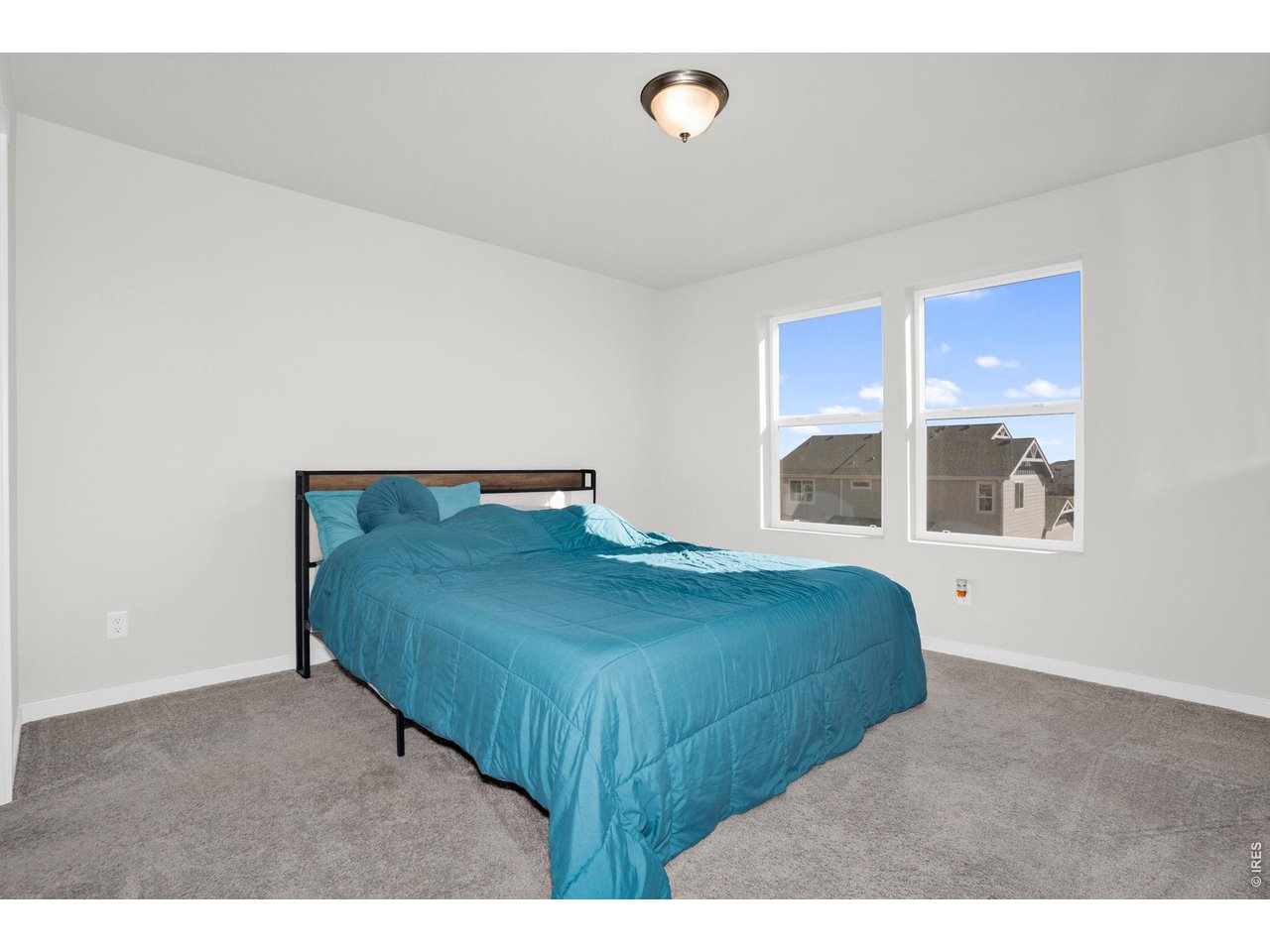 864 Frst Cyn Road Severance, CO 80550 - Photo 17 of 39 a bedroom with a bed and window