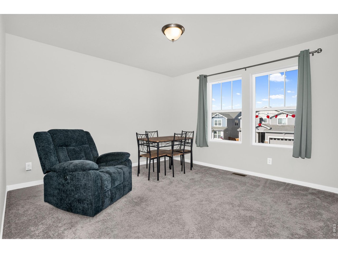 864 Frst Cyn Road Severance, CO 80550 - Photo 21 of 39 a living room with furniture and a dining table