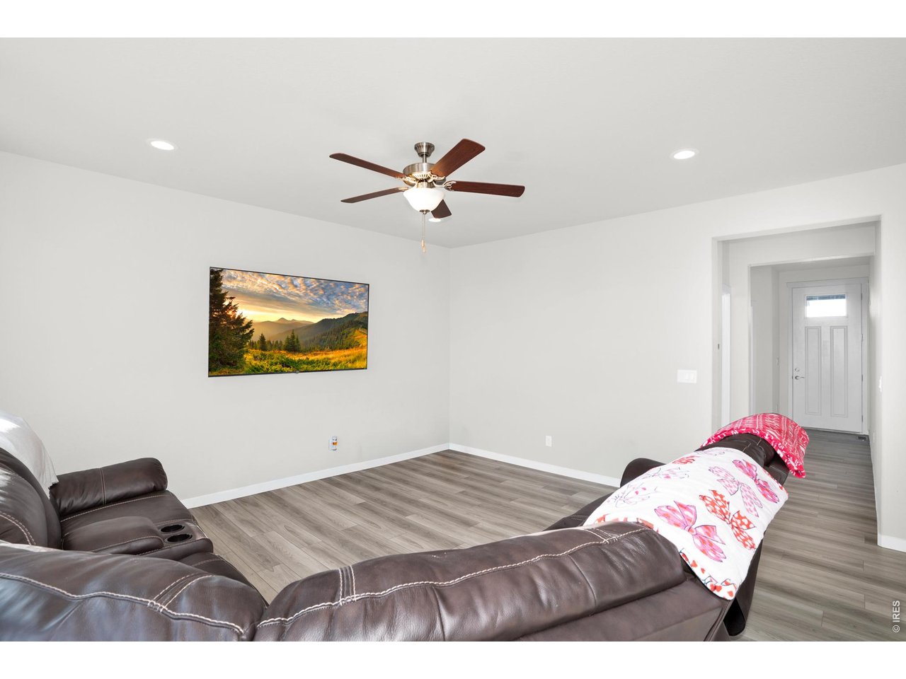 864 Frst Cyn Road Severance, CO 80550 - Photo 6 of 39 a bedroom with a bed and a couch