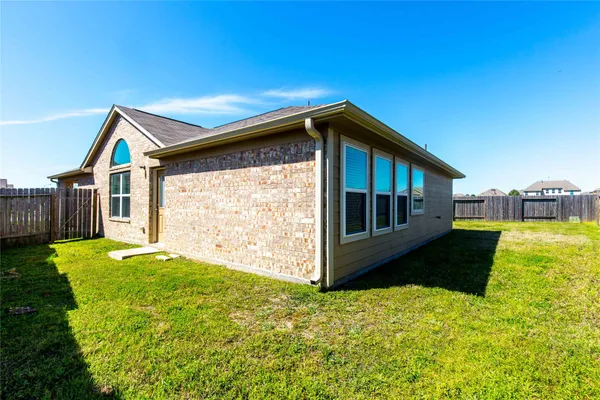 a front view of a house with yard