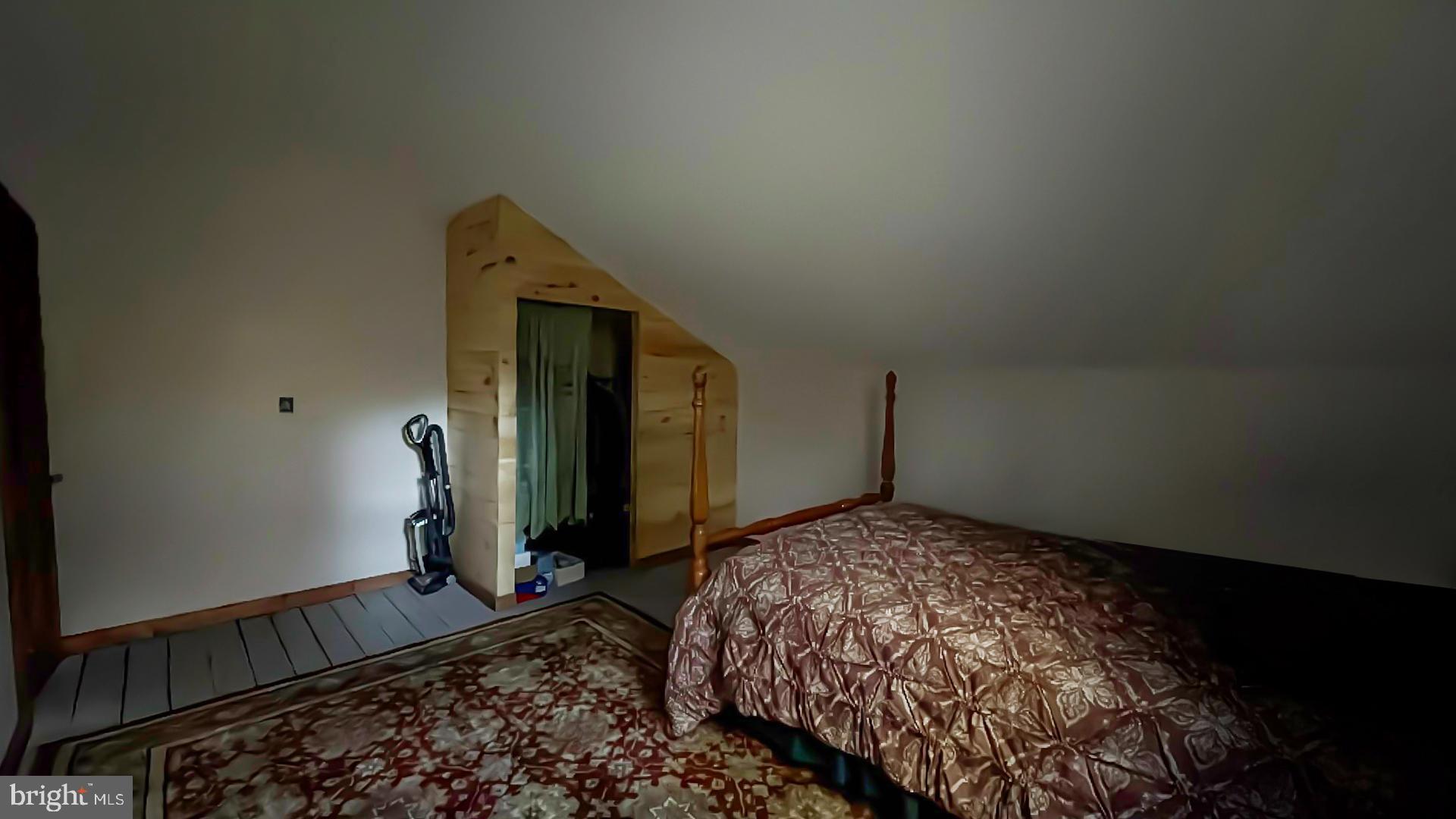 117 Grove Road Delta, PA 17314 - Photo 11 of 23 Cozy attic retreat with rustic charm.