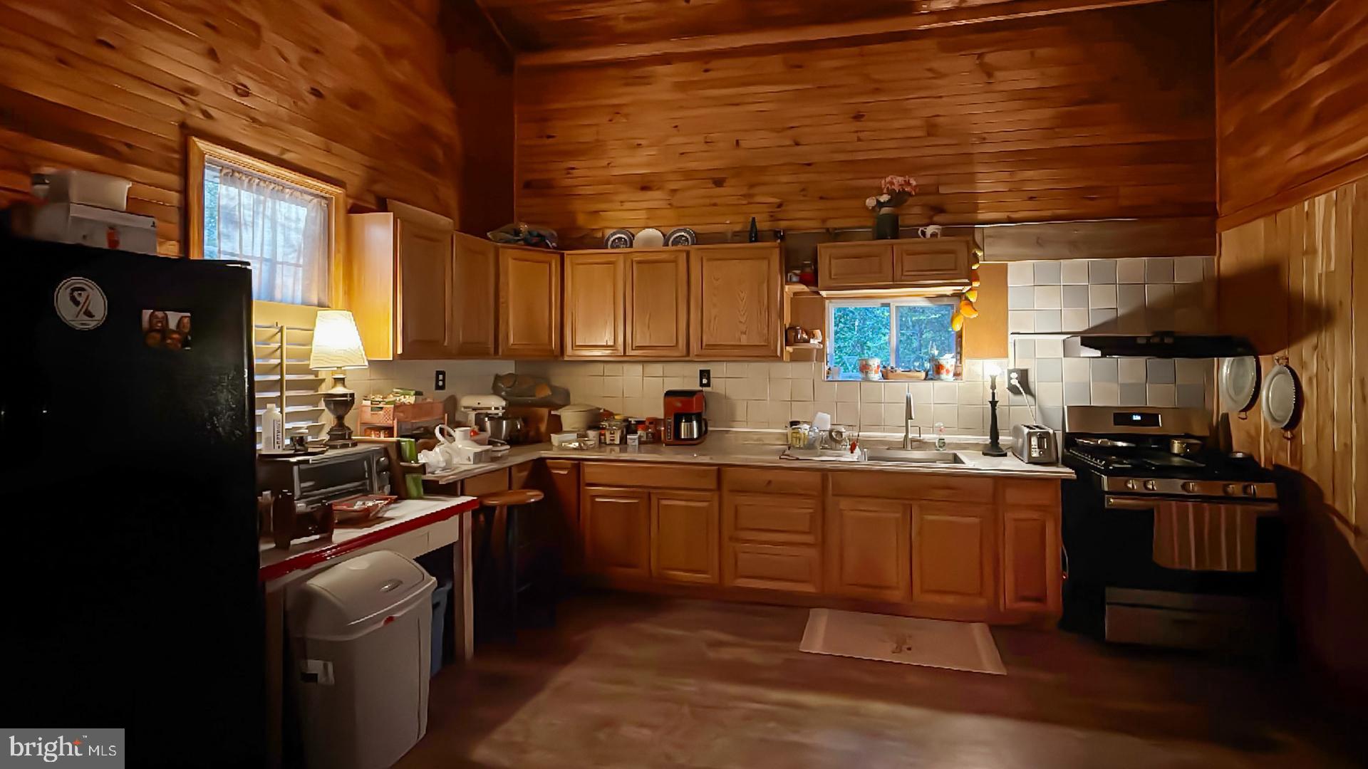 117 Grove Road Delta, PA 17314 - Photo 8 of 23 Cozy kitchen with rustic wooden charm.