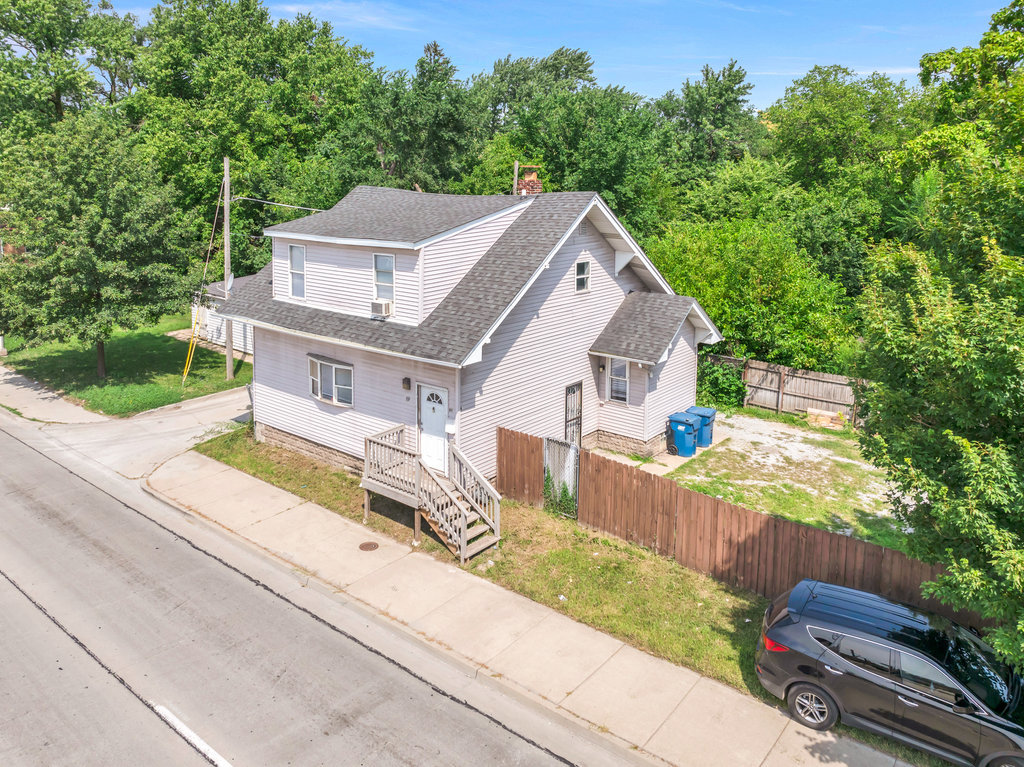 69 East 159th Street Harvey, IL 60426 - Photo 20 of 25 a aerial view of a house with a yard