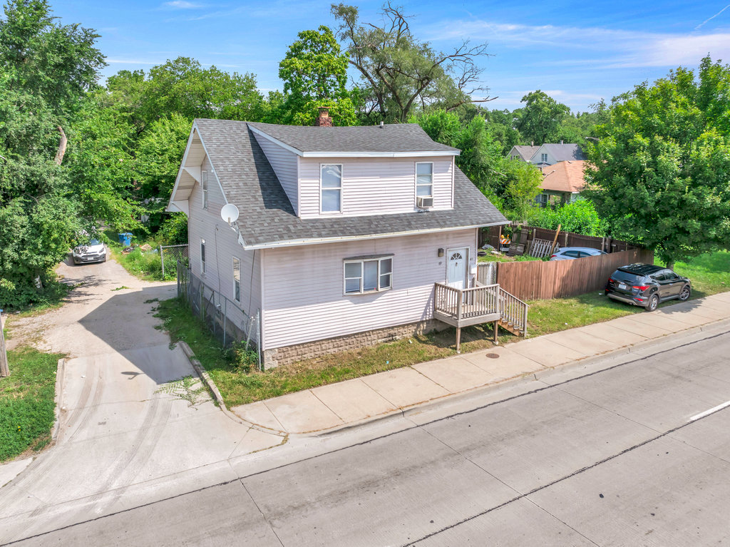 69 East 159th Street Harvey, IL 60426 - Photo 23 of 25 front view of house with a yard