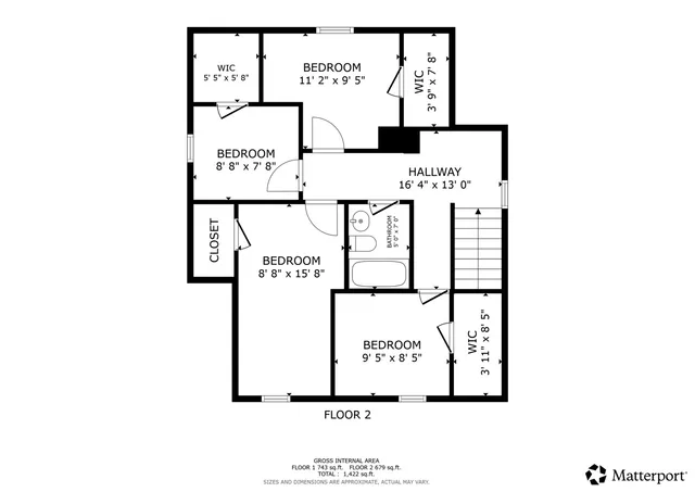 a picture of a wall with a white wall and sign