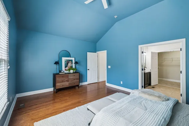 a view of a brick house with a large window