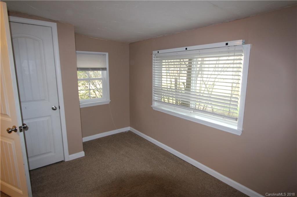 6616 Charlie Walker Road Kannapolis, NC 28081 - Photo 11 of 16 a view of an empty room with a window
