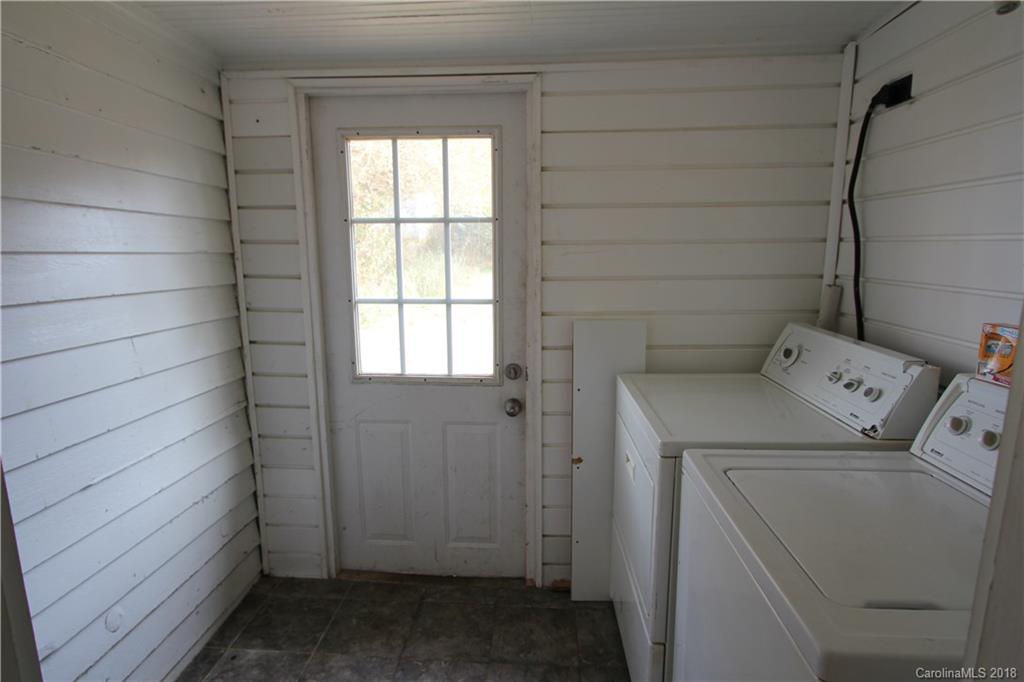 6616 Charlie Walker Road Kannapolis, NC 28081 - Photo 16 of 16 a utility room with dryer and washer