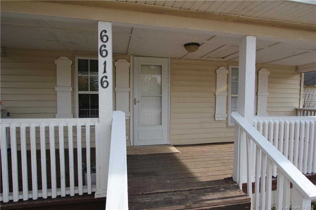 6616 Charlie Walker Road Kannapolis, NC 28081 - Photo 3 of 16 a view of a wooden door