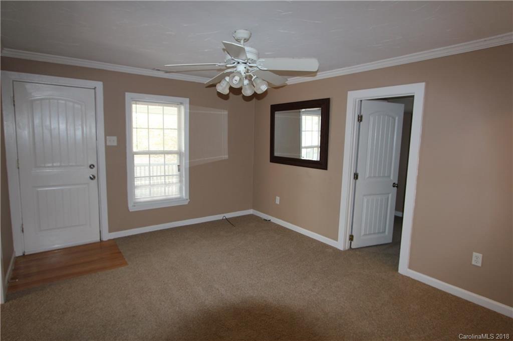 6616 Charlie Walker Road Kannapolis, NC 28081 - Photo 4 of 16 a view of an empty room with a window