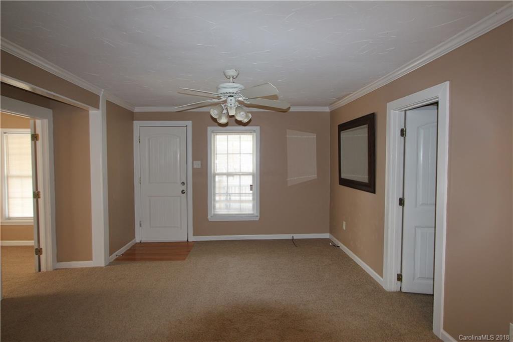 6616 Charlie Walker Road Kannapolis, NC 28081 - Photo 6 of 16 a view of an empty room with a window