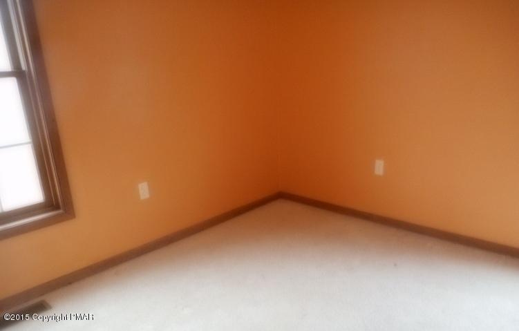 258 Lehman Road Bushkill, PA 18324 - Photo 4 of 8 a view of a small space with a window
