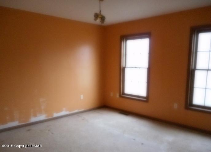 258 Lehman Road Bushkill, PA 18324 - Photo 6 of 8 an empty room with a window