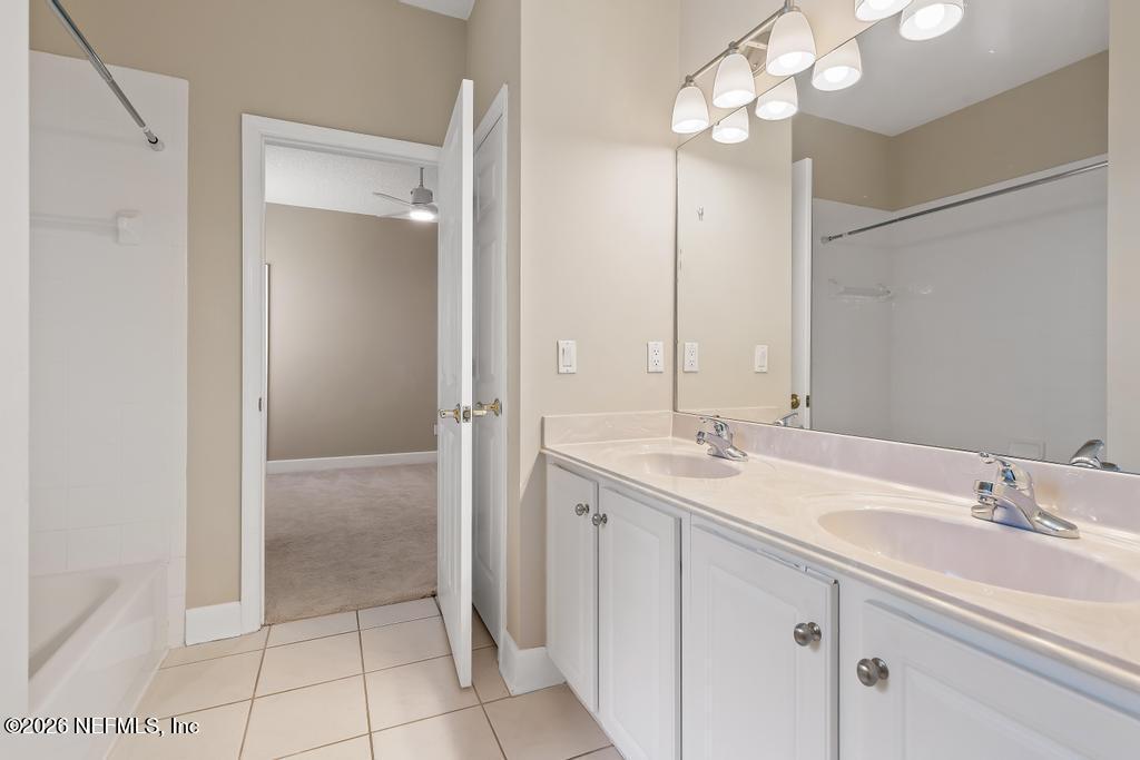 337 South Mill View Way Ponte Vedra Beach, FL 32082 - Photo 39 of 55 a bathroom with a sink and a mirror