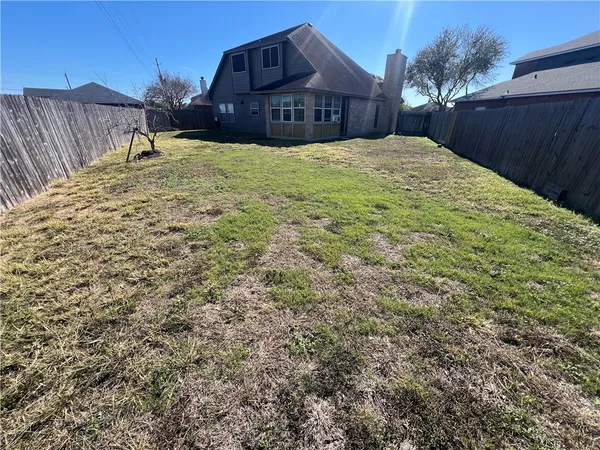 a house view with a outdoor space