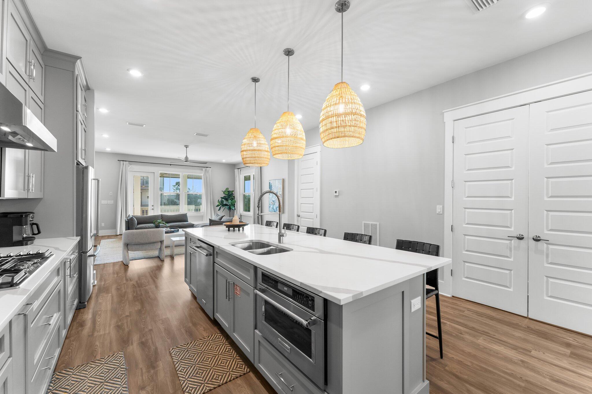 34 West Majestic Palm Dr Inlet Beach Inlet Beach, FL 32461 - Photo 14 of 71 a kitchen with a stove a kitchen island a sink and a stove