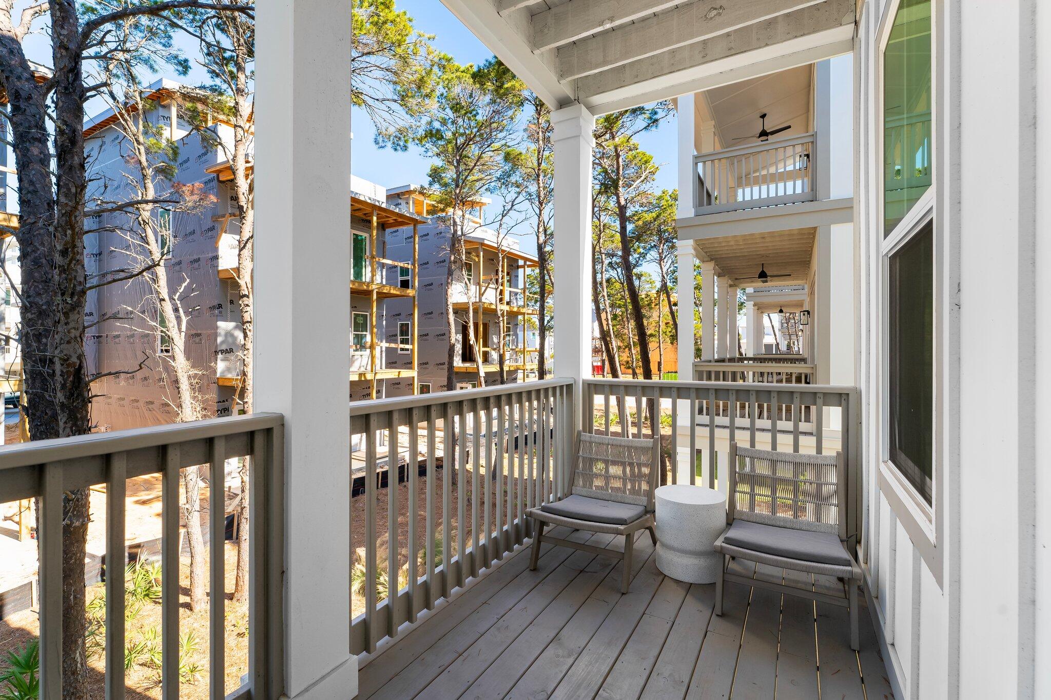 34 West Majestic Palm Dr Inlet Beach Inlet Beach, FL 32461 - Photo 19 of 71 a view of a balcony with wooden floor