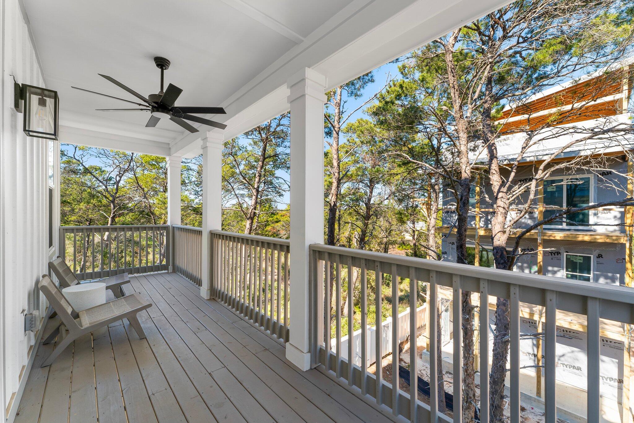 34 West Majestic Palm Dr Inlet Beach Inlet Beach, FL 32461 - Photo 35 of 71 a view of a porch with wooden floor and outdoor space