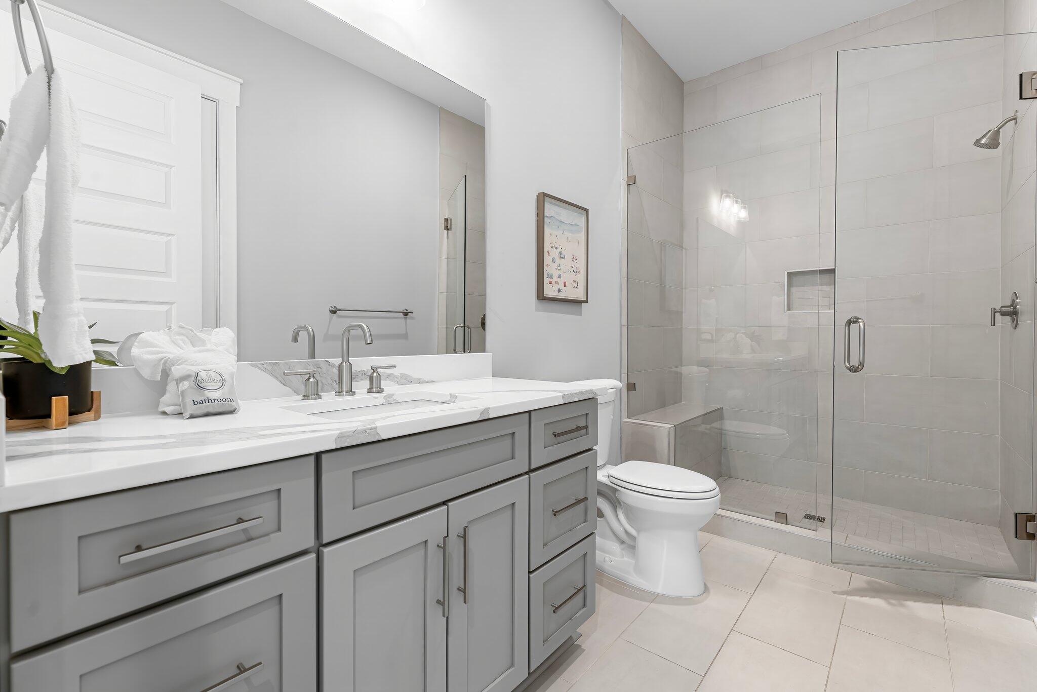 34 West Majestic Palm Dr Inlet Beach Inlet Beach, FL 32461 - Photo 44 of 71 a bathroom with a toilet sink and mirror