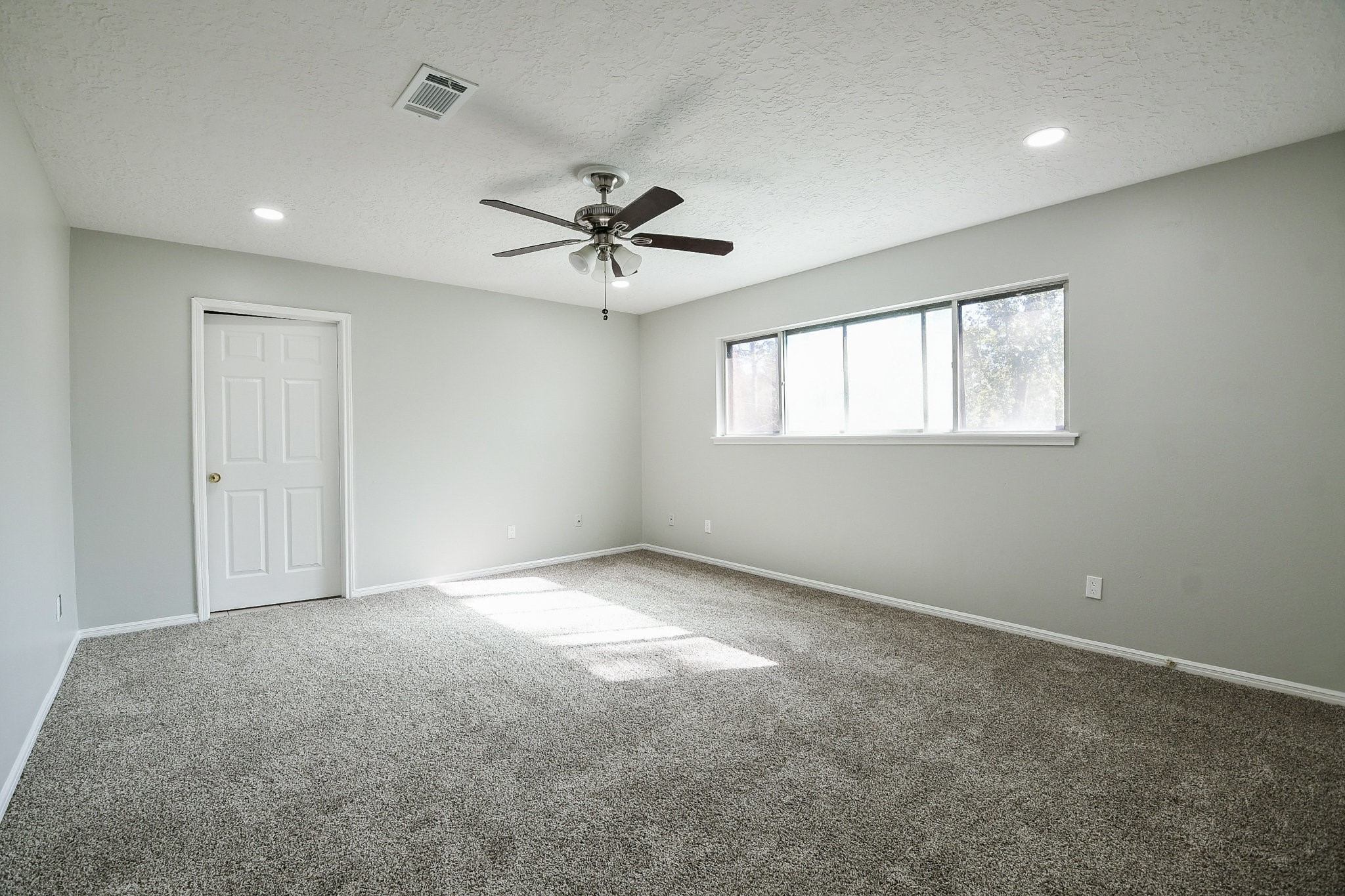 1007 Maranon Lane Houston, TX 77090 - Photo 22 of 36 a view of an empty room with a window